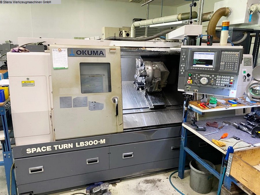 gebrauchte Drehmaschinen CNC Dreh- und Fräszentrum OKUMA SpaceTurn LB 300 MC / 1000