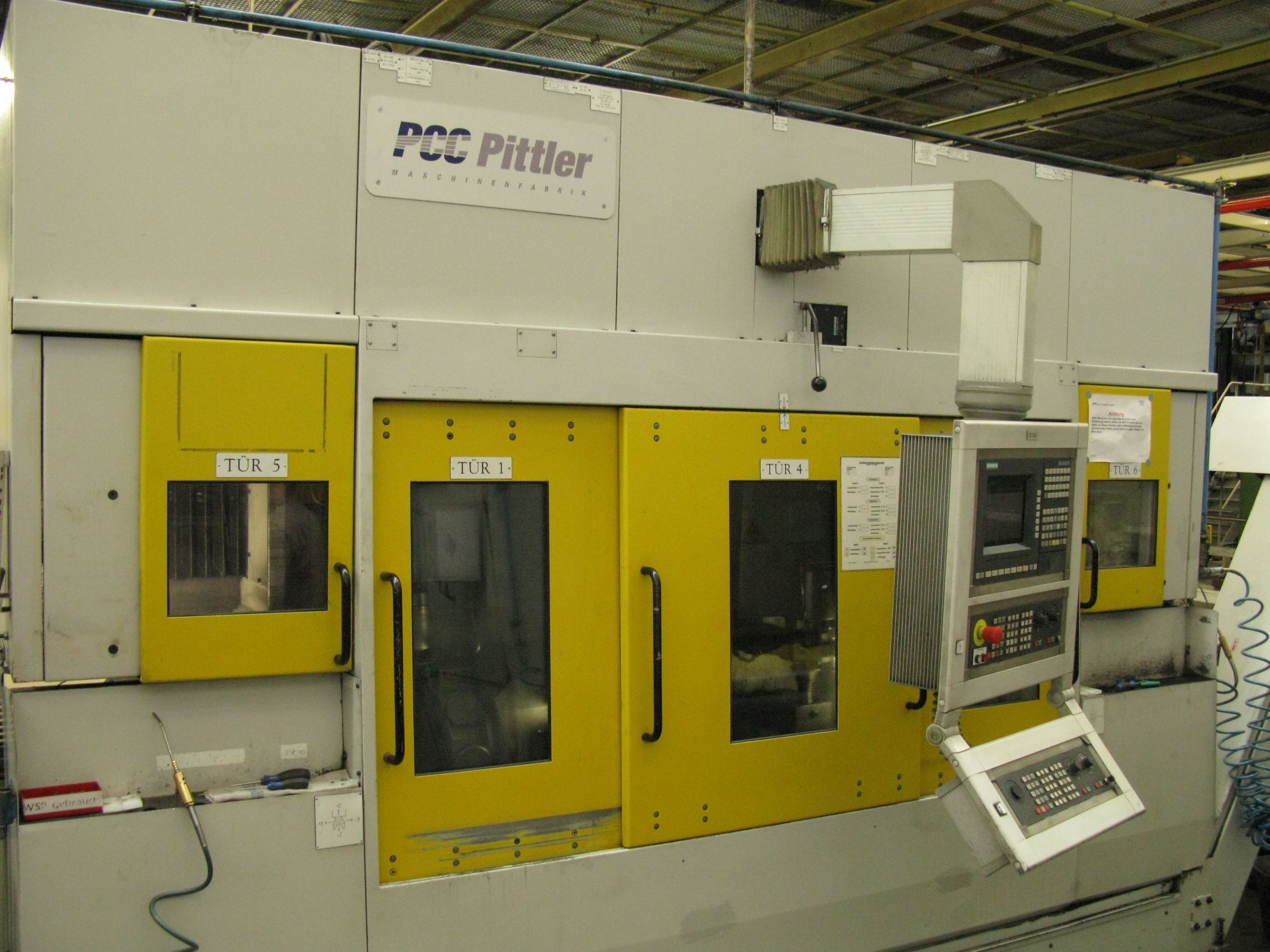 gebrauchte Metallbearbeitungsmaschinen CNC Drehmaschine PITTLER PV SL 1/2-2