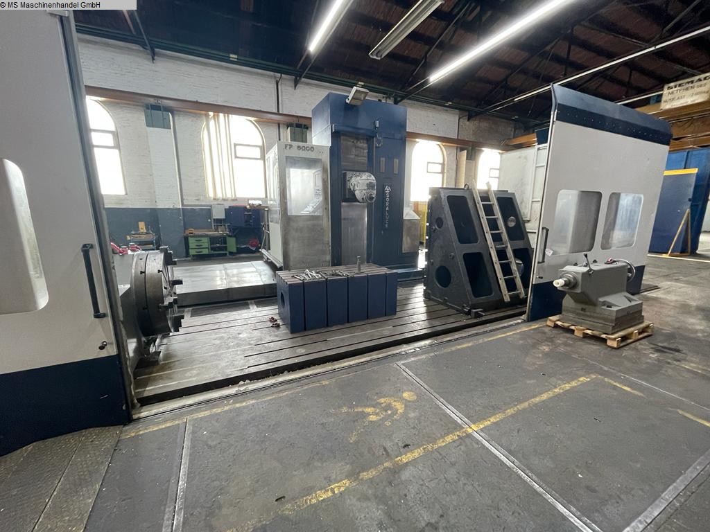 Travelling column milling machine